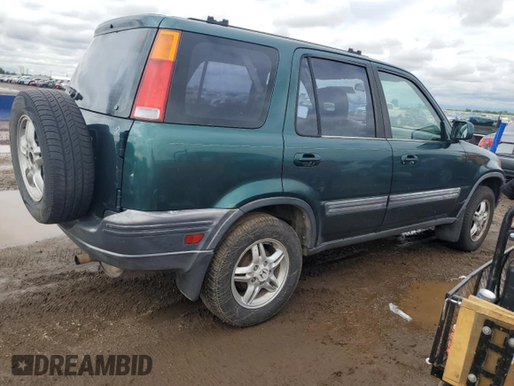 1999 Honda CR-V EX z VIN JHLRD1869XC064785, wystawiony jako Copart lot #58666215 z przebiegiem 241 633 mil mil oraz Czysty tytuł • Clean title. Historia ofert i sprzedaży dostępna na DreamBid. Obrazek 3.