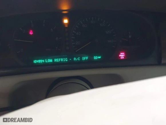 1999 Cadillac Eldorado ESC with VIN 1G6EL12Y8XU612393, listed as a IAAI auction lot 41761839 with 104,994 mi miles. Bid and sale history available at carsss.com. Image 7.
