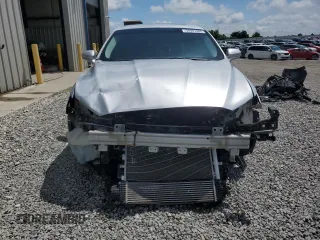 2016 Ford Fusion Titanium z VIN 3FA6P0D94GR181179, wystawiony jako Copart lot #56987005 z przebiegiem 79 841 mil mil oraz Czysty tytuł • Clean title. Historia ofert i sprzedaży dostępna na DreamBid. Obrazek 5.