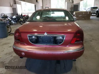 1998 Lincoln Continental with VIN 1LNFM97V6WY622919, listed as a Copart auction lot 70195324 with 219,712 mi miles and Non Repairable. Bid and sale history available at carsss.com. Image 6.