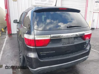 2013 Dodge Durango Crew with VIN 1C4RDJDG3DC675676, listed as a IAAI auction lot 41765289 with 140,626 mi miles. Bid and sale history available at carsss.com. Image 3.