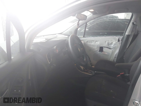 2022 Chevrolet Trax LS with VIN KL7CJKSM9NB543040, listed as a IAAI auction lot 41461219 with 38,157 mi miles and . Bid and sale history available at DreamBid. Image 5.