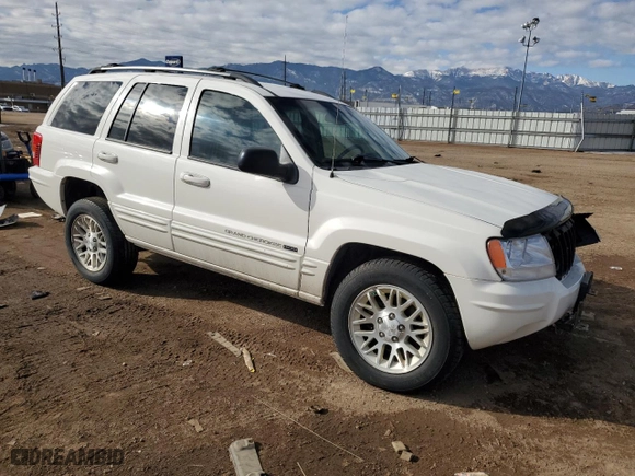 2004 Jeep Grand Cherokee Limited with VIN 1J4GW58N74C142578, listed as a Copart auction lot 43137315 with 93,934 mi miles and Salvage Title. Bid and sale history available at carsss.com. Image 4.