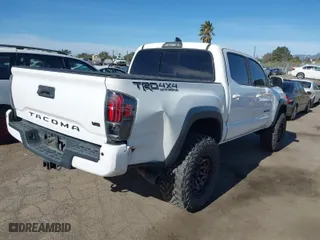 2019 Toyota Tacoma 4WD SR with VIN 3TMCZ5AN3KM277204, listed as a IAAI auction lot 41278640 with 78,930 mi miles. Bid and sale history available at carsss.com. Image 4.