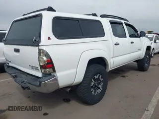 2009 Toyota Tacoma PreRunner with VIN 3TMJU62N49M076433, listed as a IAAI auction lot 41902369 with 164,827 mi miles. Bid and sale history available at carsss.com. Image 4.