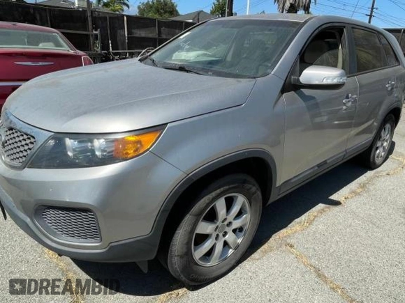 2012 Kia Sorento LX with VIN 5XYKT3A10CG304310, listed as a Copart auction lot 82711014 with 170,280 mi miles and Clean Title. Bid and sale history available at DreamBid. Image 2.