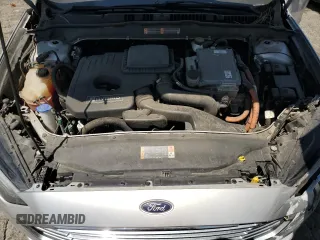 2017 Ford Fusion Hybrid SE z VIN 3FA6P0LU9HR306927, wystawiony jako Copart lot #63943395 z przebiegiem 157 851 mil mil oraz Czysty tytuł • Clean title. Historia ofert i sprzedaży dostępna na DreamBid. Obrazek 11.