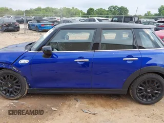 2021 MINI Hardtop 4 Door Cooper S with VIN WMWXU9C00M2N60370, listed as a IAAI auction lot 42426257 with 11,288 mi miles and . Bid and sale history available at DreamBid. Image 14.