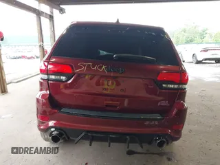2018 Jeep Grand Cherokee SRT z VIN 1C4RJFDJ0JC231510, wystawiony jako IAAI lot #42445896 z przebiegiem 85 000 mil mil oraz . Historia ofert i sprzedaży dostępna na DreamBid. Obrazek 17.