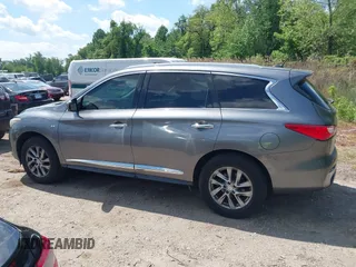 2015 Infiniti QX60 z VIN 5N1AL0MM3FC521774, wystawiony jako IAAI lot #42182939 z przebiegiem 99 438 mil mil oraz . Historia ofert i sprzedaży dostępna na DreamBid. Obrazek 14.