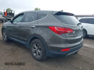 2014 Hyundai Santa Fe z VIN 5XYZTDLB1EG144290, wystawiony jako IAAI lot #42126367 z przebiegiem 138 525 mil mil oraz . Historia ofert i sprzedaży dostępna na DreamBid. Obrazek 3.