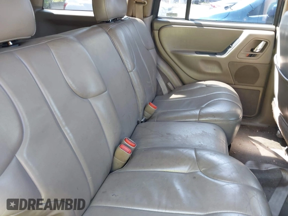 2000 Jeep Grand Cherokee Laredo with VIN 1J4GW48S8YC380039, listed as a IAAI auction lot 42510307 with 215,776 mi miles and . Bid and sale history available at DreamBid. Image 8.