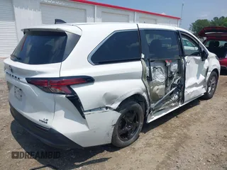 2021 Toyota Sienna LE with VIN 5TDKRKEC6MS029020, listed as a IAAI auction lot 42381285 with 103,260 mi miles and . Bid and sale history available at DreamBid. Image 4.