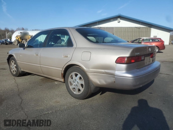 1999 Toyota Camry LE z VIN JT2BF22K4X0199123, wystawiony jako Copart lot #53456665 z przebiegiem 181 526 mil mil oraz Szkoda całkowita • Salvage title. Historia ofert i sprzedaży dostępna na DreamBid. Obrazek 2.