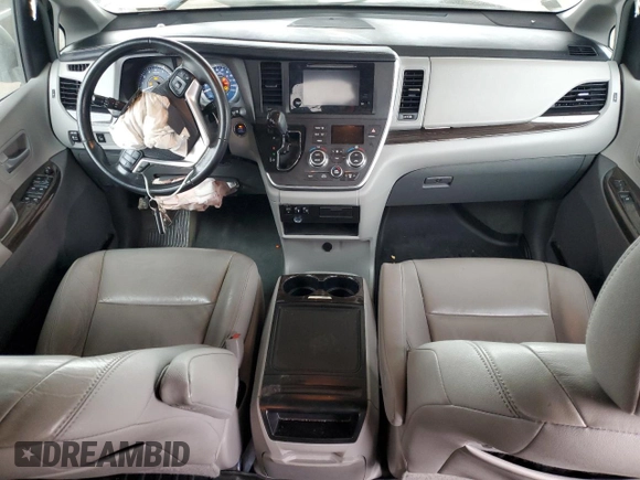 2016 Toyota Sienna XLE with VIN 5TDYK3DC8GS729616, listed as a Copart auction lot 59748995 with 144,469 mi miles and Salvage title. Bid and sale history available at DreamBid. Image 8.