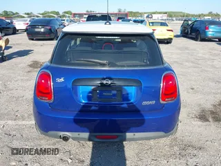 2019 MINI Hardtop Cooper with VIN WMWXP5C52K2H97728, listed as a IAAI auction lot 42026666 with 61,464 mi miles and . Bid and sale history available at DreamBid. Image 16.
