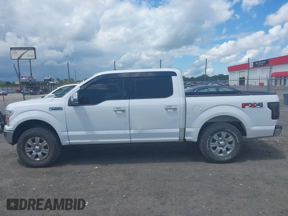 2018 Ford F-150 XL with VIN 1FTEW1E50JKC91068, listed as a IAAI auction lot 42221345 with 135,095 mi miles and . Bid and sale history available at DreamBid. Image 14.
