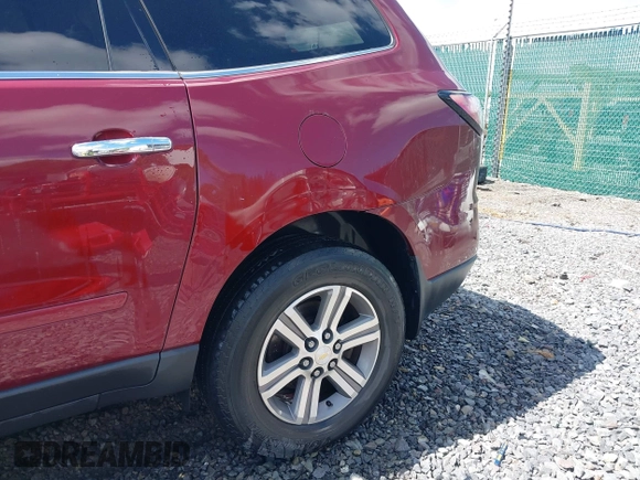 2015 Chevrolet Traverse LT z VIN 1GNKVHKD9FJ373749, wystawiony jako IAAI lot #42291335 z przebiegiem 136 558 mil mil oraz . Historia ofert i sprzedaży dostępna na DreamBid. Obrazek 6.