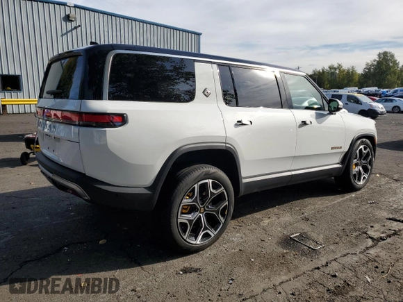 2024 Rivian R1S Adventure z VIN 7PDSGABAXRN035766, wystawiony jako Copart lot #77481034 z przebiegiem 6 590 mil mil oraz Szkoda całkowita • Salvage title. Historia ofert i sprzedaży dostępna na DreamBid. Obrazek 3.