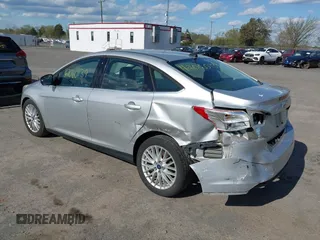 2012 Ford Focus SEL with VIN 1FAHP3H29CL151658, listed as a IAAI auction lot 42060139 with 149,547 mi miles and . Bid and sale history available at carsss.com. Image 3.