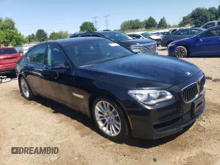 2014 BMW 7 Series ALPINA B7 xDrive with VIN WBAYF8C51ED653036, listed as a Copart auction lot 58156764 with 116,611 mi miles and Salvage Title. Bid and sale history available at DreamBid. Image 4.