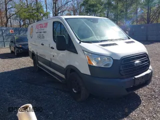 2016 Ford Transit Cargo with VIN 1FTYR1ZM5GKB36241, listed as a IAAI auction lot 41829632 with 266,258 mi miles. Bid and sale history available at carsss.com. Image 1.