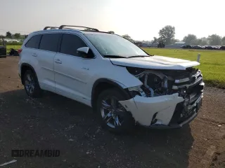 2019 Toyota Highlander Hybrid Limited with VIN 5TDDGRFH2KS071859, listed as a Copart auction lot 63679845 with 56,709 mi miles and Salvage title. Bid and sale history available at DreamBid. Image 4.