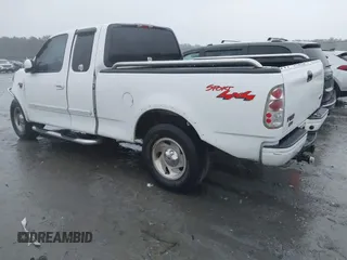 1999 Ford F-150 XL with VIN 1FTRX18L6XNB48352, listed as a IAAI auction lot 41717057 with 171,654 mi miles. Bid and sale history available at carsss.com. Image 3.