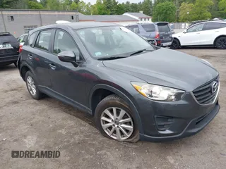 2016 Mazda CX-5 Sport with VIN JM3KE4BY9G0710004, listed as a IAAI auction lot 42323434 with 83,320 mi miles and . Bid and sale history available at DreamBid. Image 13.