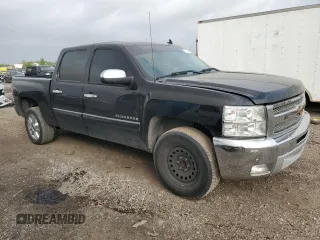 2013 Chevrolet Silverado 1500 LT with VIN 3GCPCSE00DG372708, listed as a Copart auction lot 51591465 with 210,934 mi miles and Salvage Title. Bid and sale history available at DreamBid. Image 4.