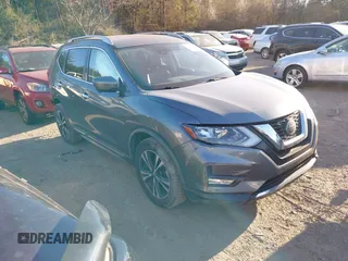 2018 Nissan Rogue SV with VIN JN8AT2MTXJW466386, listed as a IAAI auction lot 41696067 with 115,077 mi miles and . Bid and sale history available at carsss.com. Image 1.