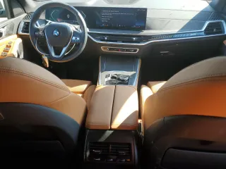 2025 BMW X5 sDrive40i with VIN 5UX13EU05S9W82678, listed as a Copart auction lot 49857255 with 9,901 mi miles and Salvage Title. Bid and sale history available at carsss.com. Image 8.