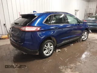 2015 Ford Edge SEL with VIN 2FMTK4J9XFBC04898, listed as a IAAI auction lot 41397525 with 121,319 mi miles. Bid and sale history available at carsss.com. Image 4.