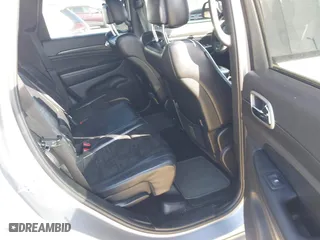 2018 Jeep Grand Cherokee Laredo E with VIN 1C4RJFAG0JC284927, listed as a IAAI auction lot 41964013 with 130,145 mi miles. Bid and sale history available at carsss.com. Image 8.