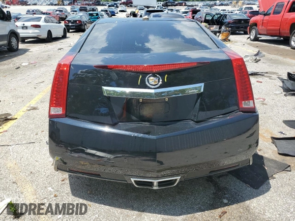 2011 Cadillac CTS Performance with VIN 1G6DK1ED3B0146122, listed as a Copart auction lot 63493035 with 141,225 mi miles and Salvage title. Bid and sale history available at DreamBid. Image 6.