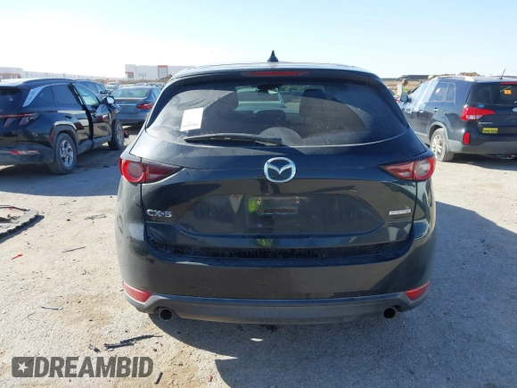 2020 Mazda CX-5 Touring with VIN JM3KFACM0L0780265, listed as a IAAI auction lot 41825873 with 151,888 mi miles. Bid and sale history available at carsss.com. Image 16.