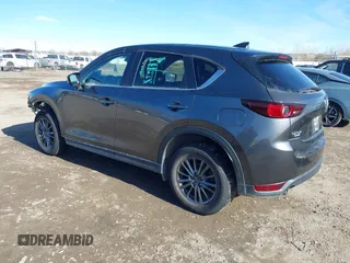 2019 Mazda CX-5 Touring with VIN JM3KFBCM7K0611896, listed as a IAAI auction lot 41732111 with 90,826 mi miles. Bid and sale history available at carsss.com. Image 3.