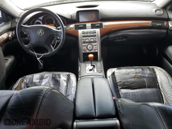 2005 Acura RL z VIN JH4KB16535C018850, wystawiony jako Copart lot #59306055 z przebiegiem 131 881 mil mil oraz Szkoda całkowita • Salvage title. Historia ofert i sprzedaży dostępna na DreamBid. Obrazek 8.