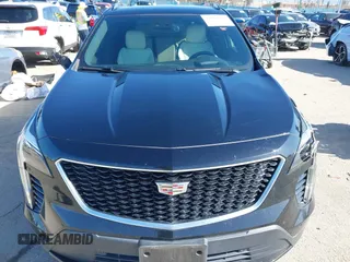 2020 Cadillac XT4 FWD Sport z VIN 1GYFZER49LF021475, wystawiony jako IAAI lot #41962892 z przebiegiem 41 603 mil mil oraz . Historia ofert i sprzedaży dostępna na DreamBid. Obrazek 12.