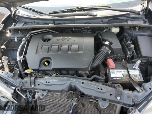 2014 Toyota Corolla L z VIN 2T1BURHE8EC190080, wystawiony jako Copart lot #60614225 z przebiegiem 194 254 mil mil oraz Szkoda całkowita • Salvage title. Historia ofert i sprzedaży dostępna na DreamBid. Obrazek 11.
