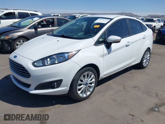 2014 Ford Fiesta SE z VIN 3FADP4BJ3EM183267, wystawiony jako IAAI lot #42058257 z przebiegiem 57 872 mil mil oraz . Historia ofert i sprzedaży dostępna na DreamBid. Obrazek 17.