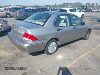 2003 Mitsubishi Lancer ES with VIN JA3AJ26E63U007501, listed as a IAAI auction lot 41771016 with 146,984 mi miles. Bid and sale history available at carsss.com. Image 4.