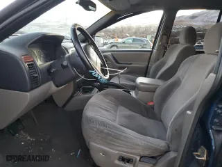 1999 Jeep Grand Cherokee Laredo with VIN 1J4GW58N6XC784679, listed as a Copart auction lot 85345304 with 234,584 mi miles and Salvage Title. Bid and sale history available at carsss.com. Image 7.