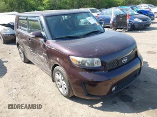 2010 Scion xB with VIN JTLZE4FE7A1101670, listed as a IAAI auction lot 42009413 with 165,418 mi miles. Bid and sale history available at carsss.com. Image 1.