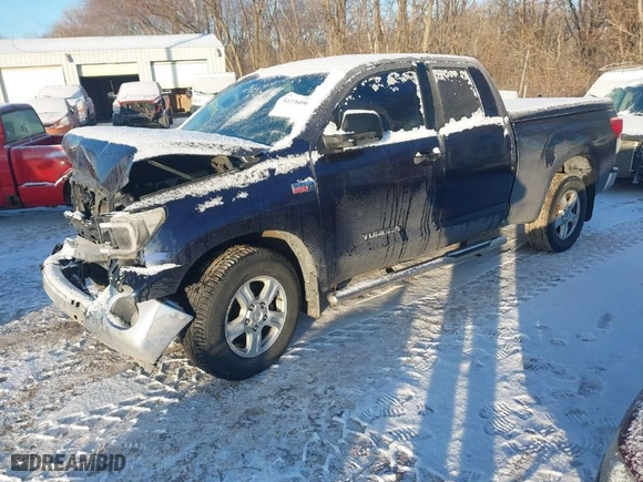 2010 Toyota Tundra 4WD Truck with VIN 5TFUW5F11AX120069, listed as a IAAI auction lot 41378490 with 413,655 mi miles. Bid and sale history available at carsss.com. Image 2.