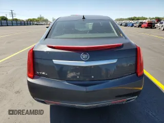 2013 Cadillac XTS Luxury with VIN 2G61R5S32D9216672, listed as a Copart auction lot 58392955 with 94,272 mi miles and Salvage title. Bid and sale history available at DreamBid. Image 6.
