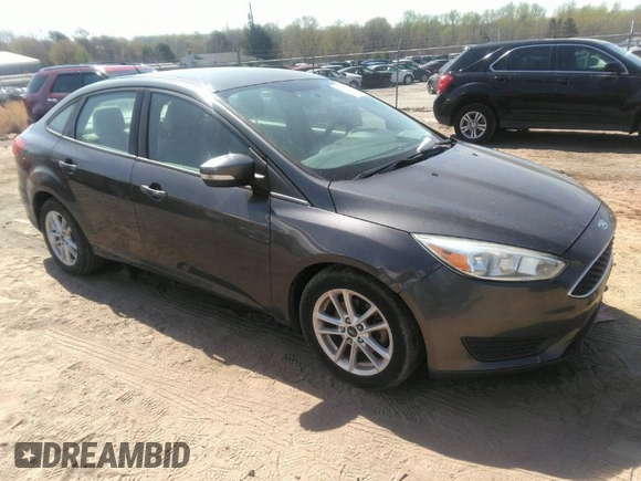 2015 Ford Focus SE with VIN 1FADP3F28FL292520, listed as a IAAI auction lot 41906723 with 74,106 mi miles. Bid and sale history available at carsss.com. Image 1.