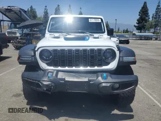 2024 Jeep Wrangler Rubicon X с VIN 1C4RJXR67RW242301, выставлен на аукционе Copart как лот 61178995 с пробегом 36 998 миль миль и Чистый • Clean title. История ставок и продаж доступна на DreamBid. Изображение 5.