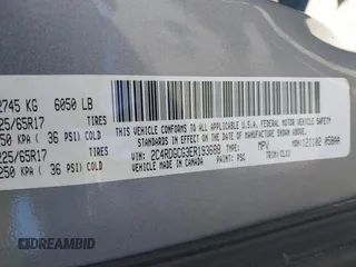 2014 Dodge Grand Caravan SXT with VIN 2C4RDGCG3ER193688, listed as a IAAI auction lot 41290544 with 73,092 mi miles and . Bid and sale history available at DreamBid. Image 9.
