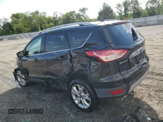 2015 Ford Escape Titanium with VIN 1FMCU0J96FUC59510, listed as a Copart auction lot 57091765 with 120,586 mi miles and Salvage title. Bid and sale history available at DreamBid. Image 2.